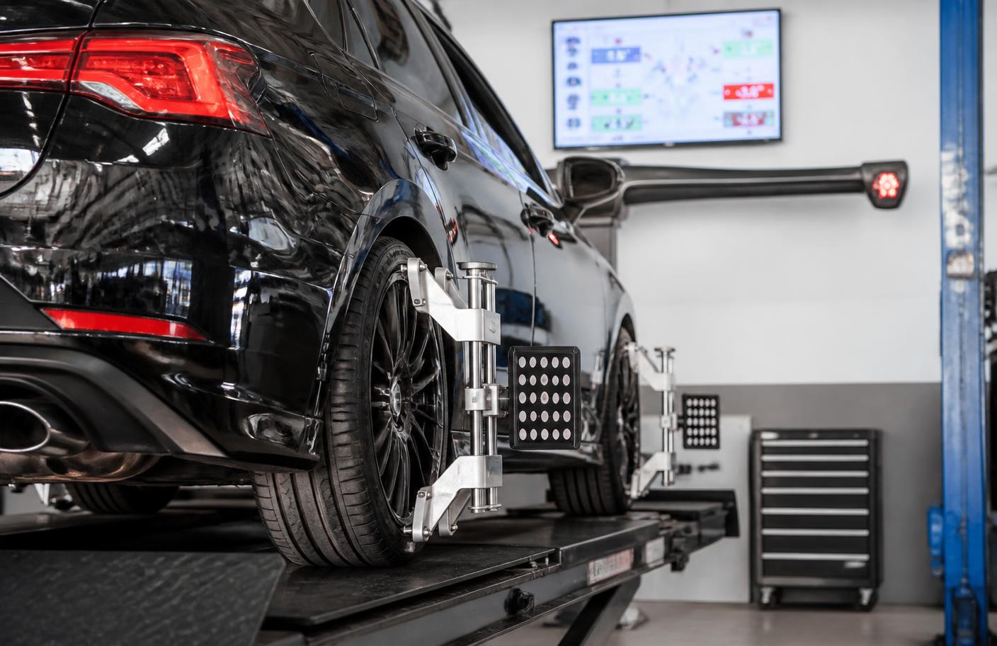Computerized wheel alignment rack